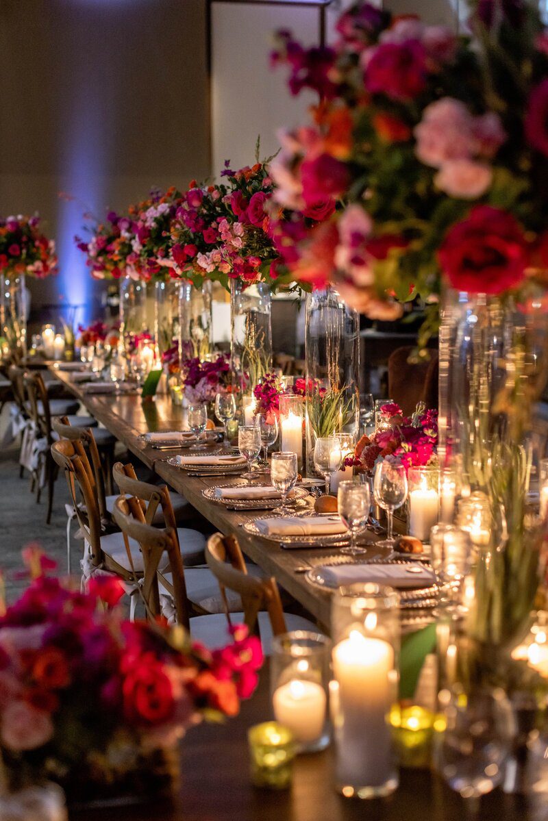 Elegant table setting with flowers and candles.
